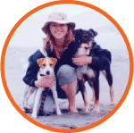 Patrice on the beach with Woody and Maggie